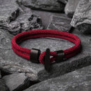 Uma pulseira Milan Line da série Ocean, com um design de corda trançada em formato de âncora