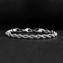 Conjunto de colar com pingente de cruz em aço inoxidável 201 e pulseira com corrente torcida (2 peças)