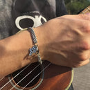 Pulseira masculina retrô elegante com cruz, aço inoxidável e corrente dupla em formato de osso de dragão.